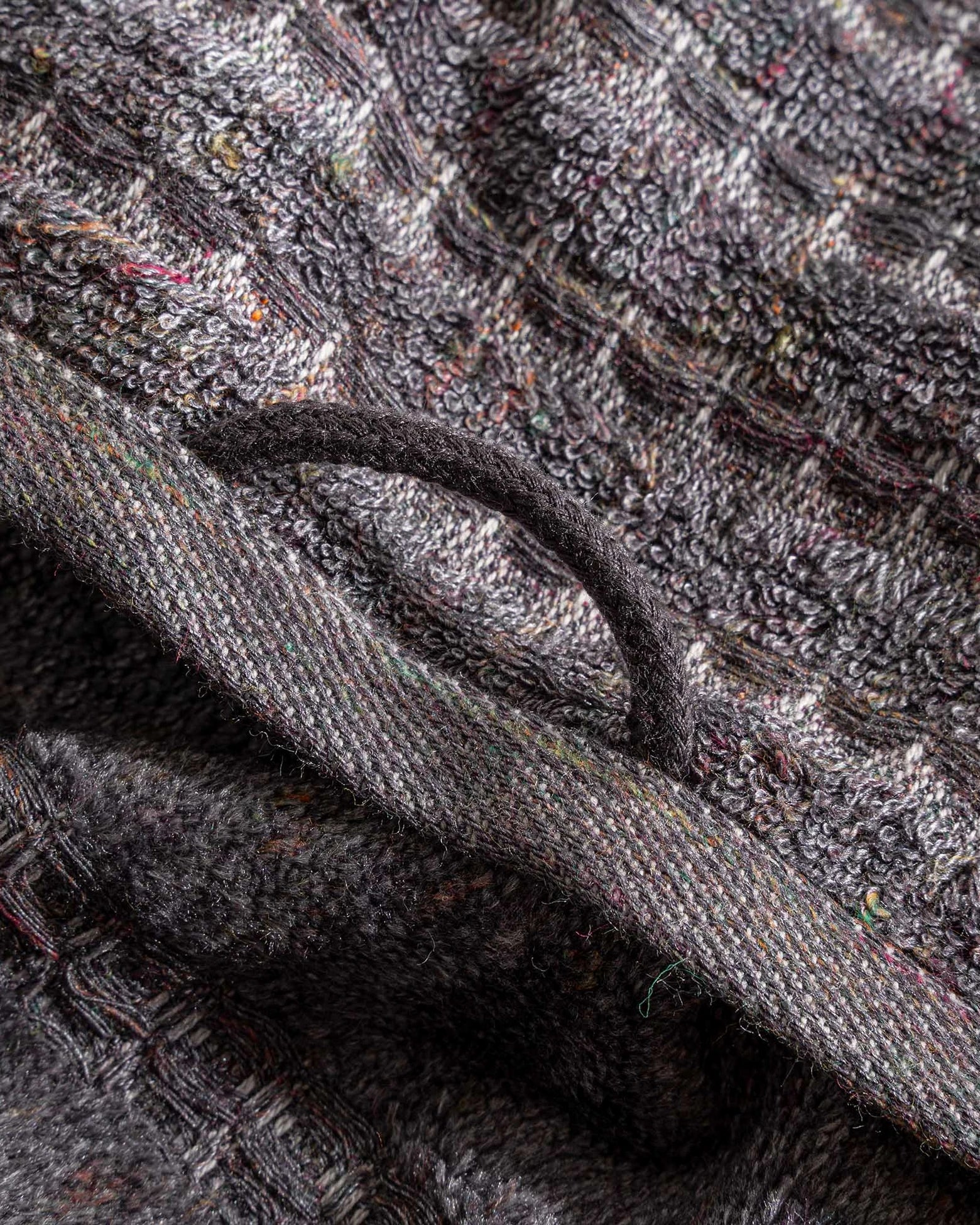 Close-up of the Zeus Organic Cotton Bath, Hand & Washcloth Set in Cozy Cobalt, showcasing the soft texture, vibrant colour with a hanger