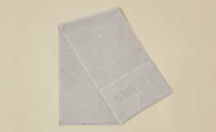 Front view of Sweat Grey gym towel, 100% cotton, 30x110 cm, with zipper pocket and antibacterial treatment