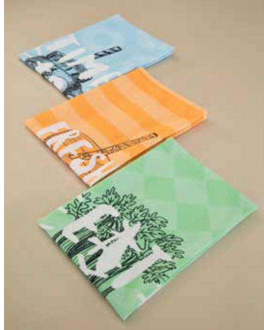Set of 3 health-themed cotton kitchen towels displayed together in blue, orange, and green, each featuring a unique digitally printed design