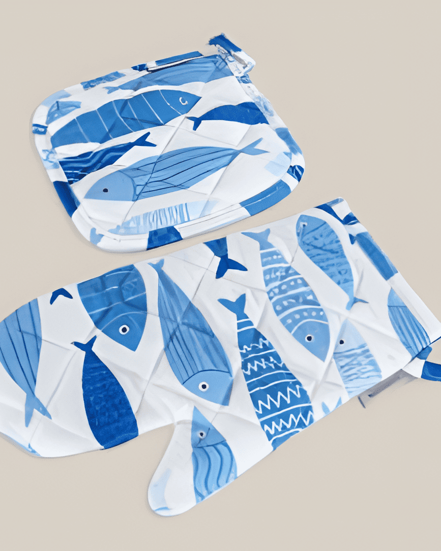 A pair of digitally printed Marin glove made with 100% cotton by Minoa, with fish patterns on it