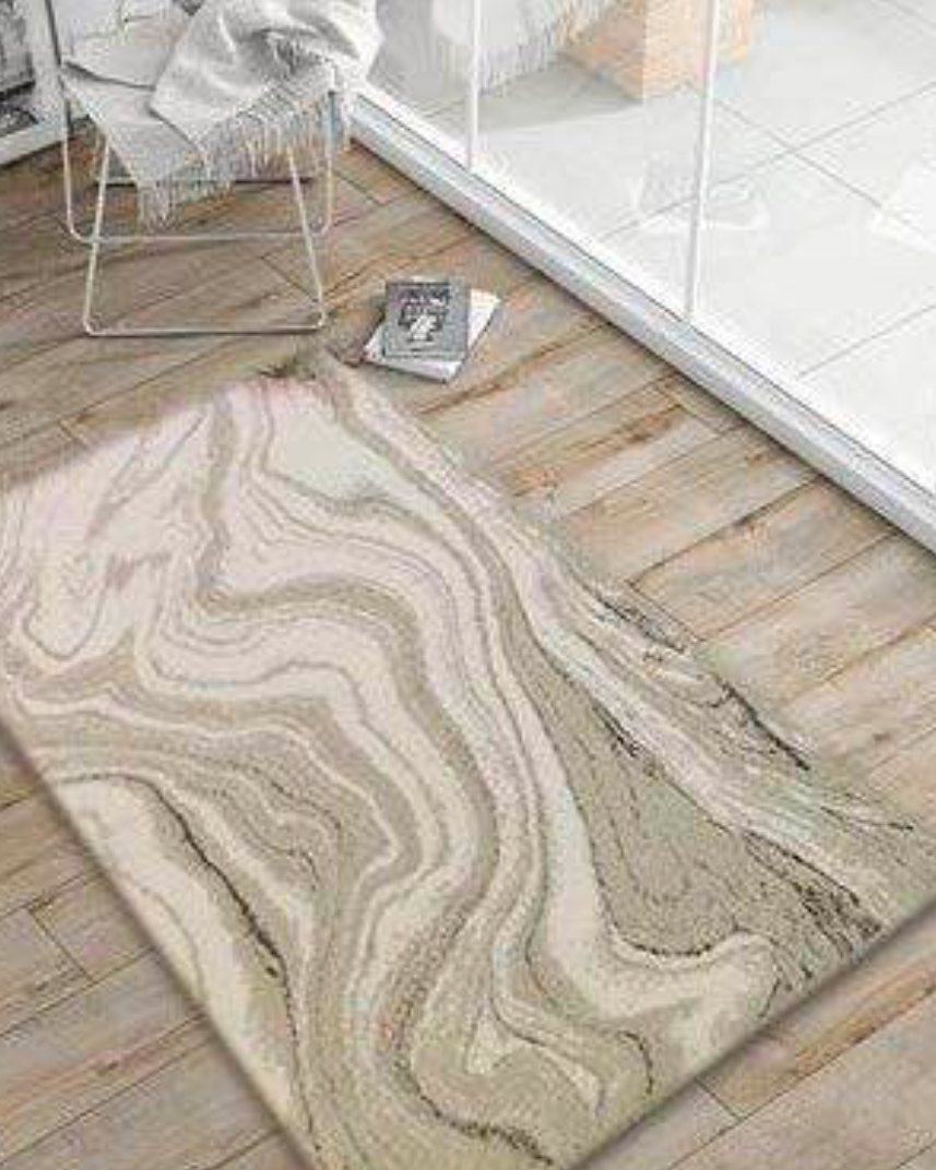 Ecru/Beige/Silver Bath Rug placed on the floor, featuring a soft, elegant design with silver accents for a sophisticated bathroom look