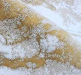 Warm and inviting ecru and beige bath rug, complemented by a soft latte hue, providing a cozy atmosphere to your bathroom