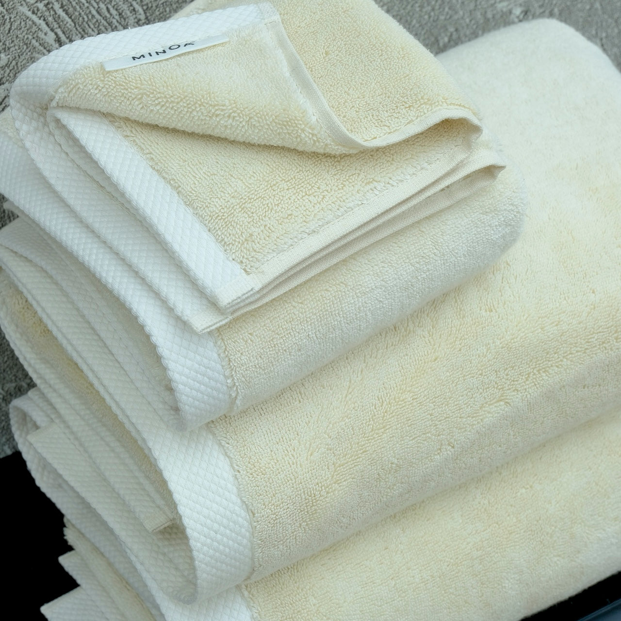 Monte Rosa organic bath towel in Raw Elegance color from Minoa USA Canada, a sustainable luxury bath towel woven from soft Aegean cotton