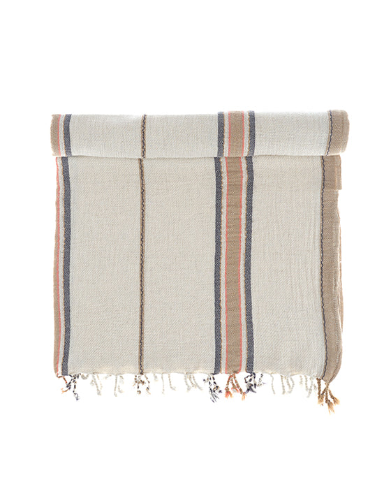 Sand and Navy Elba Turkish Towel crafted from Aegean cotton and linen highlighting light texture and breathable design of organic and luxury bath tow