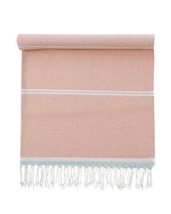 Pink towel with white stripes and fringes on a white background
