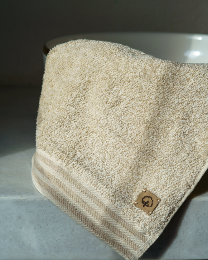 Close-up of the Raisa Hemp & Organic Cotton Hand Towel in Vanilla Embrace, highlighting the soft texture and natural colour