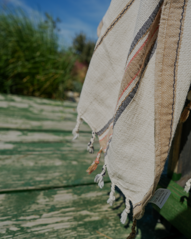 Sustainable Elba Turkish Towel under the sunshine showcasing the light and eco-friendly feel of organic bath towels