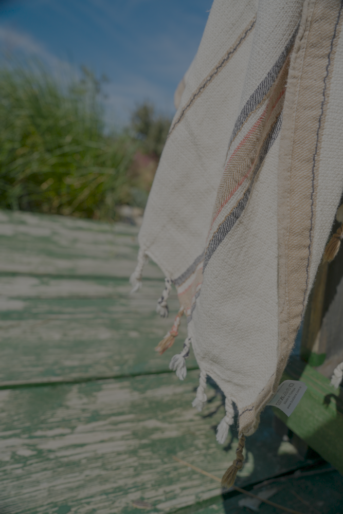 Sustainable Elba Turkish Towel under the sunshine showcasing the light and eco-friendly feel of organic bath towels