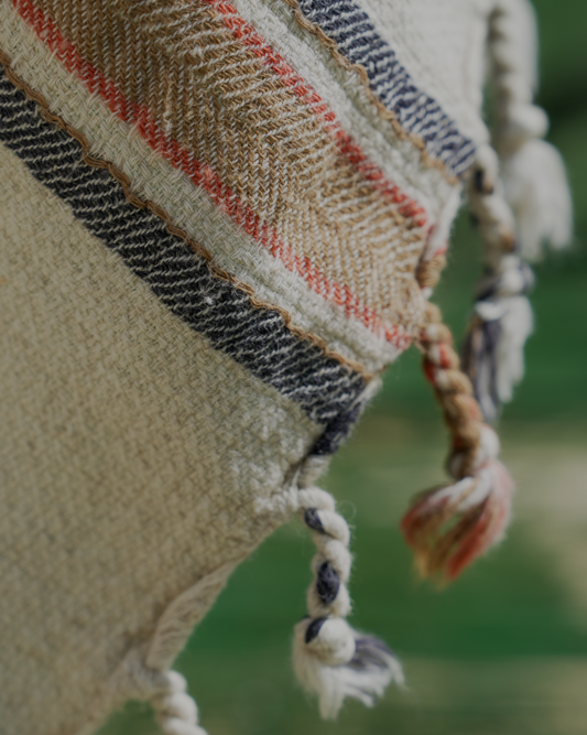 Close-up shot of organic baby blue and orange Elba Turkish towel crafted with sustainable materials