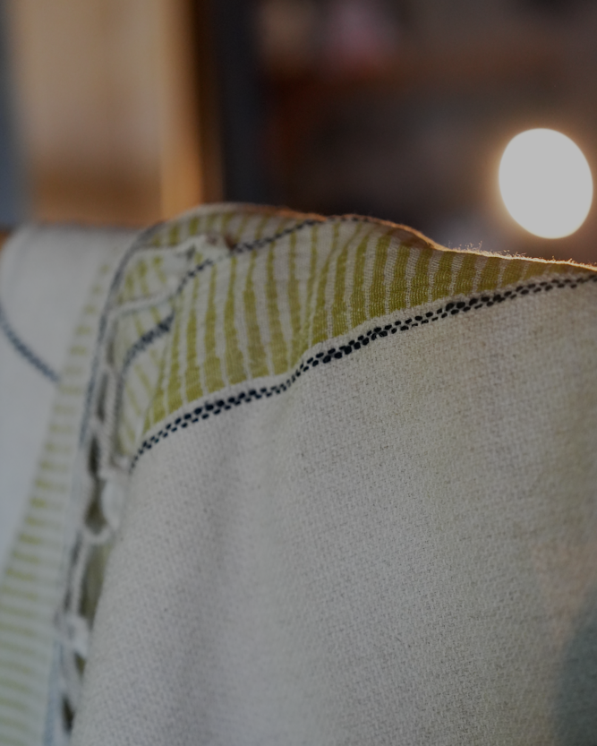 A close up shot of green version organic absorbing, and sustainable Palawan 220-gram Linen Turkish Towel