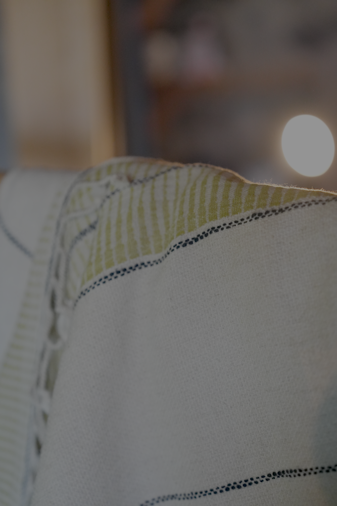 A close up shot of green version organic absorbing, and sustainable Palawan 220-gram Linen Turkish Towel