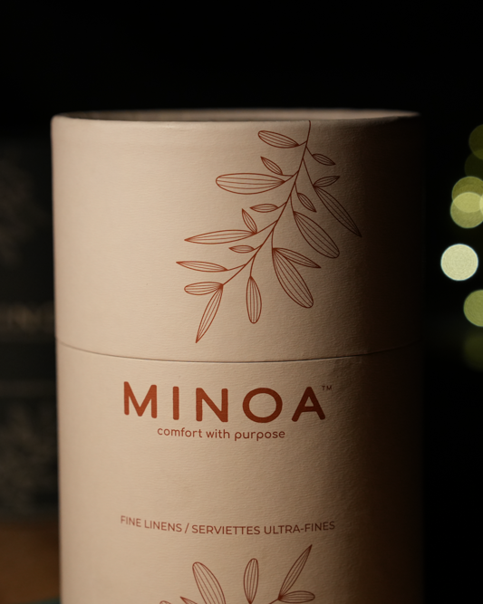 White packaging luxury case containing Plush Lite 500-gram Aegean Cotton guest bath and hand towel set pack of two by Minoa USA Canada, highlighting premium quality and soft texture of organic bath towels