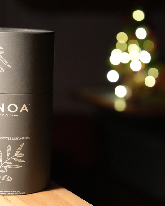 Plush Lite 500-Gram Aegean Cotton Large Bath & Hand Towel Set placed in a dark navy green luxury cylinder case