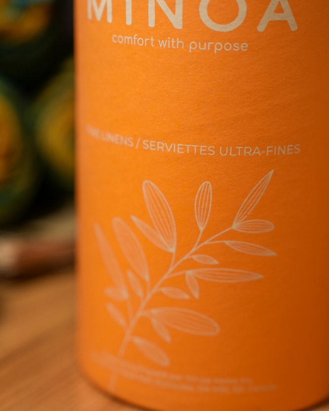 Plush Lite 500-Gram Aegean Cotton Guest Bath and Hand Towel Set elegantly presented in luxury Orange cylinder case