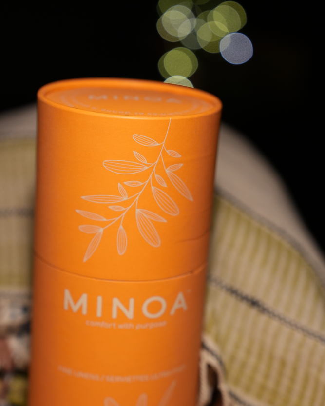 Luxury orange package of Palawan 220-gram organic linen Turkish bath towel, highlighting soft texture, premium quality, and sustainable luxury