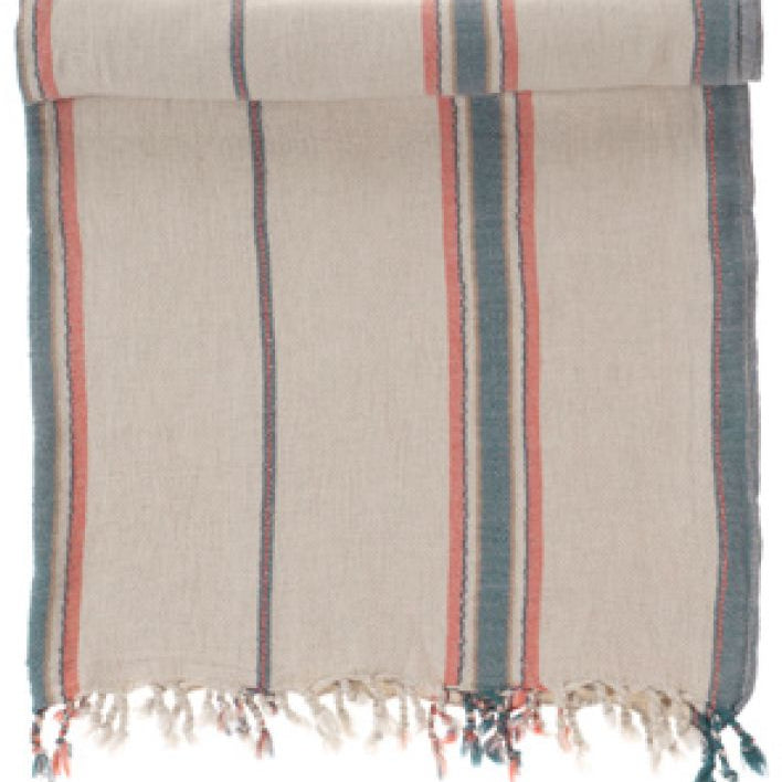 Striped towel with fringes on a white background