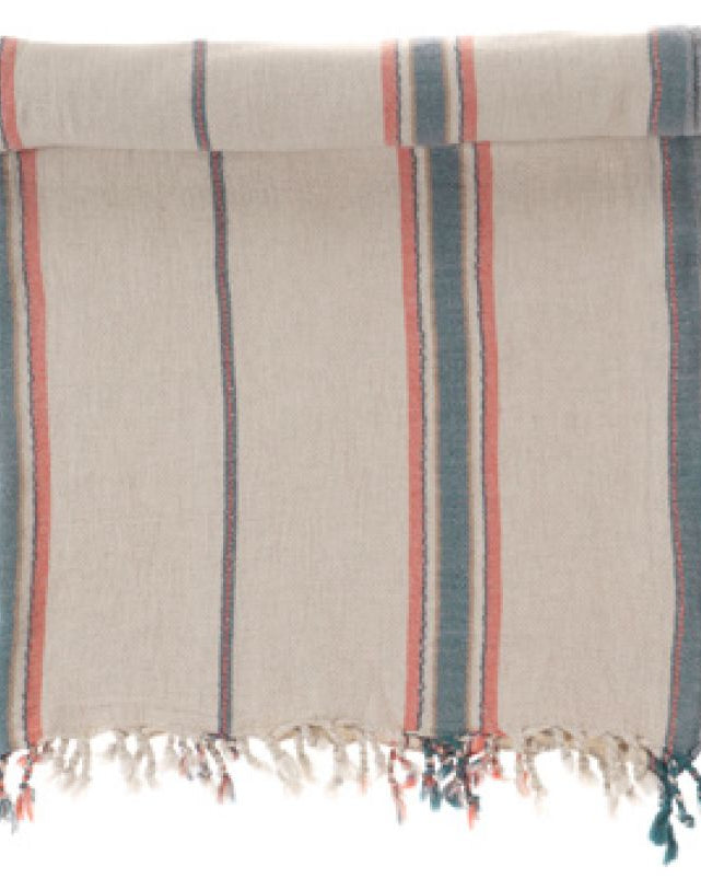Striped towel with fringes on a white background