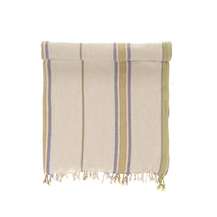 Beige towel with colorful stripes and fringes on a white background