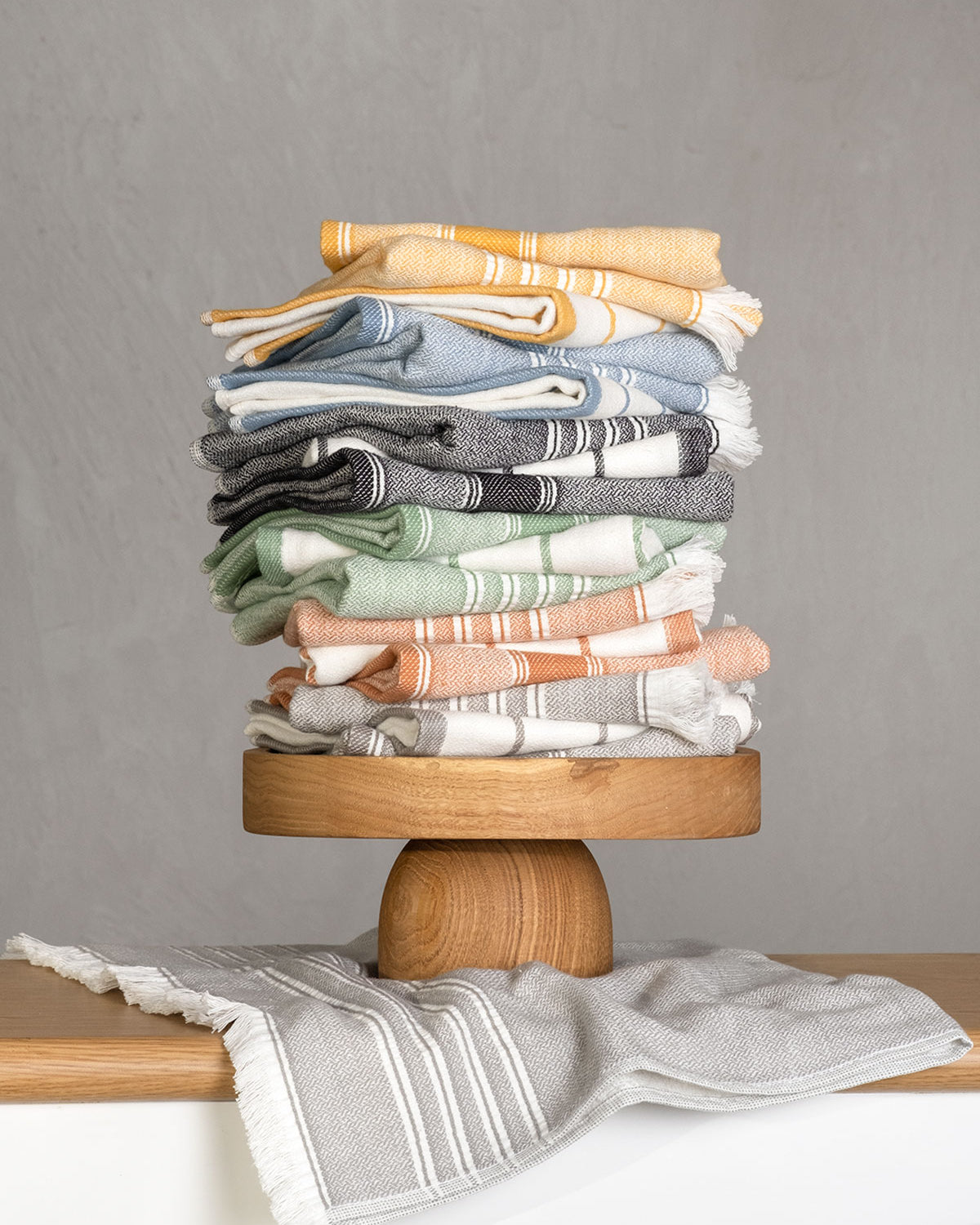 Elis Organic Aegean Cotton Kitchen Towel set of 3, featuring Lime Breeze, Silver Symphony, Midnight Velvet, Spice Serenade, Lemon Zest, and Serene Sky, neatly folded.