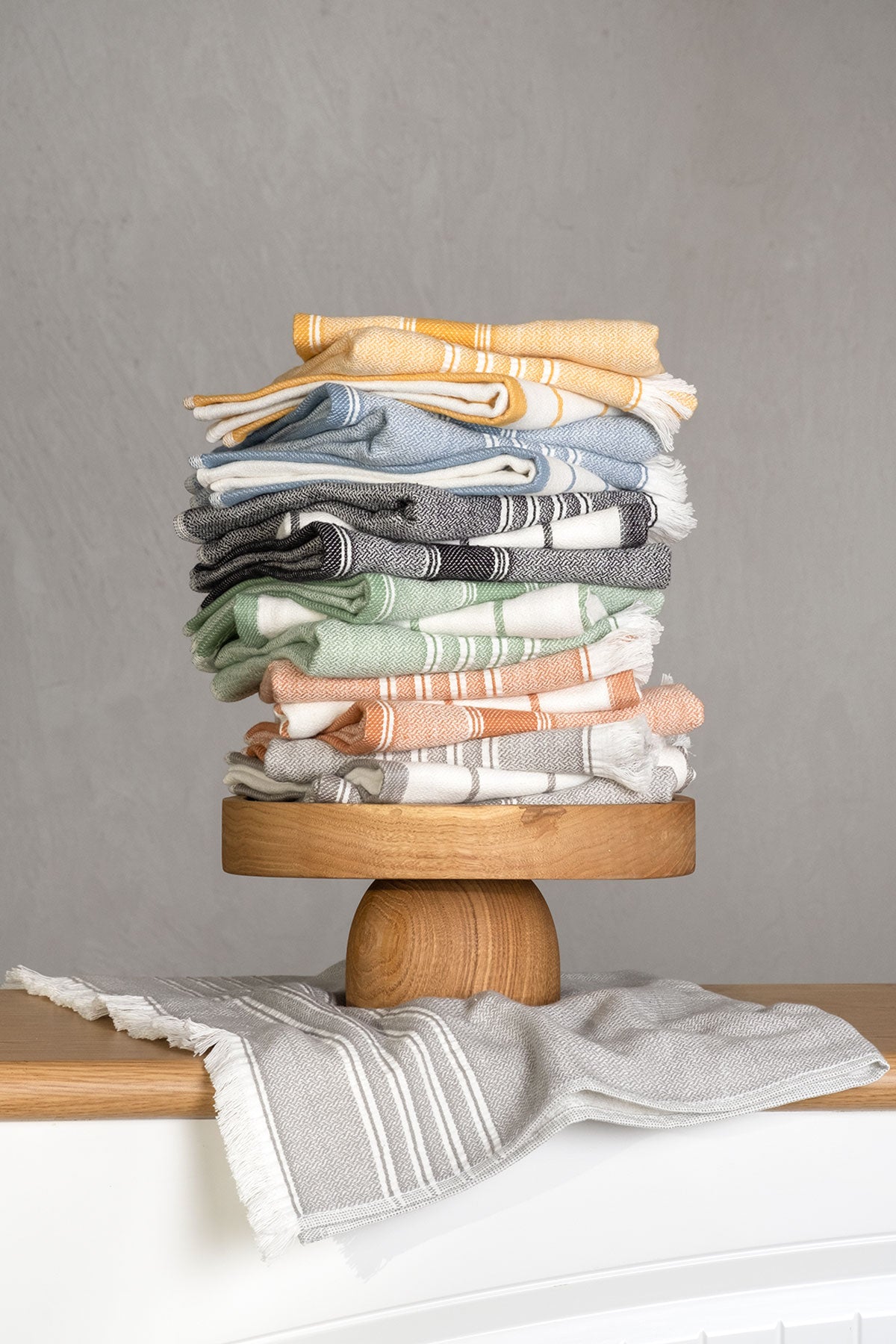 Elis Organic Aegean Cotton Kitchen Towel set of 3, featuring Lime Breeze, Silver Symphony, Midnight Velvet, Spice Serenade, Lemon Zest, and Serene Sky, neatly folded.