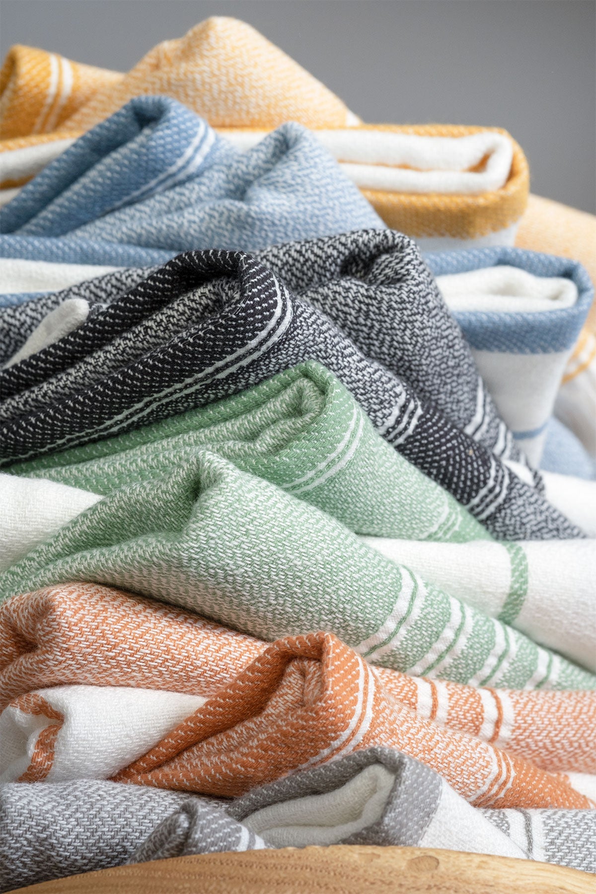 Elis Organic Aegean Cotton Kitchen Towel set of 3, featuring Lime Breeze, Silver Symphony, Midnight Velvet, Spice Serenade, Lemon Zest, and Serene Sky, neatly folded