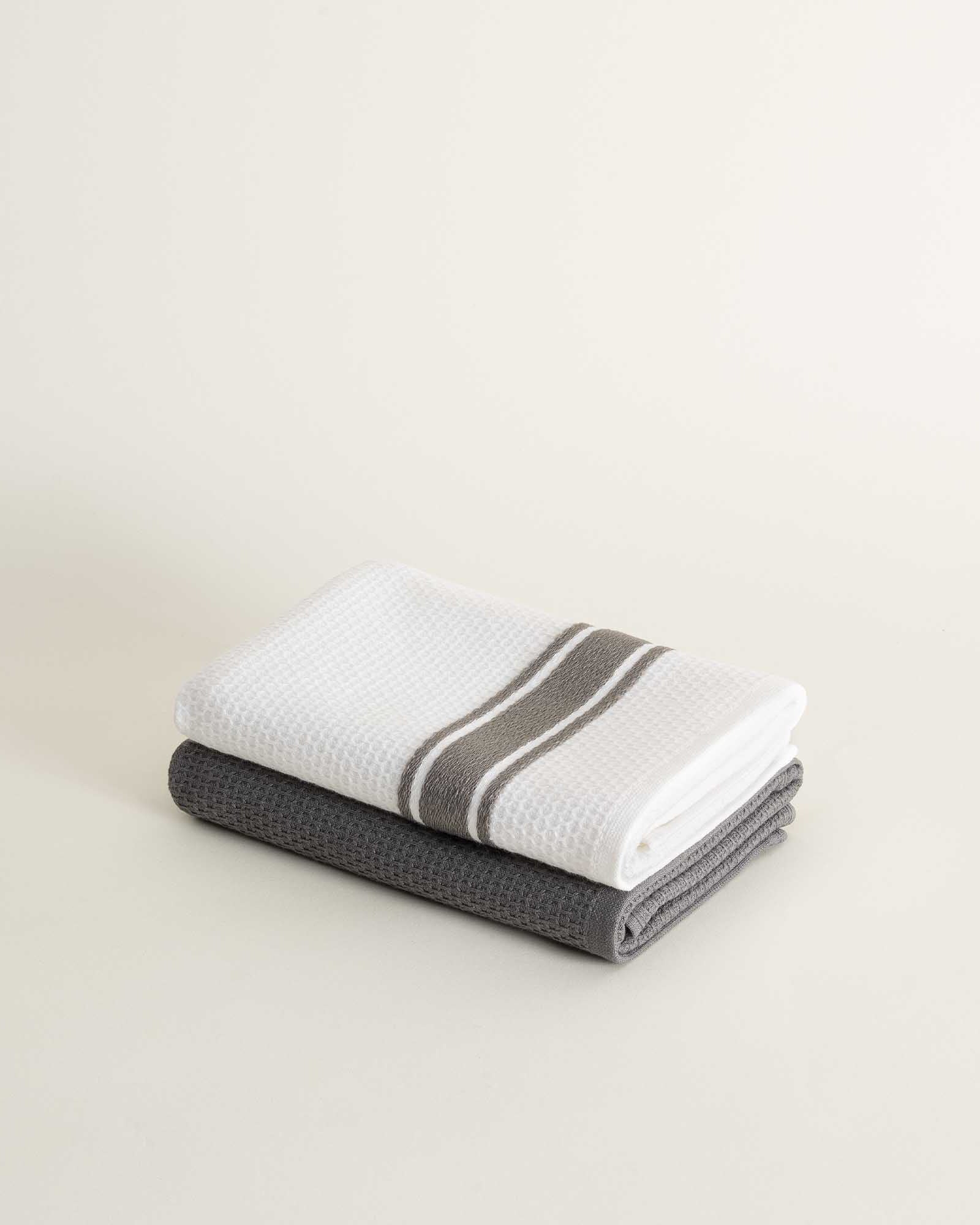Elvin Organic Aegean Cotton Kitchen Towel set of 2 in Silver Suede, neatly folded, showcasing its soft texture and elegant, understated colour