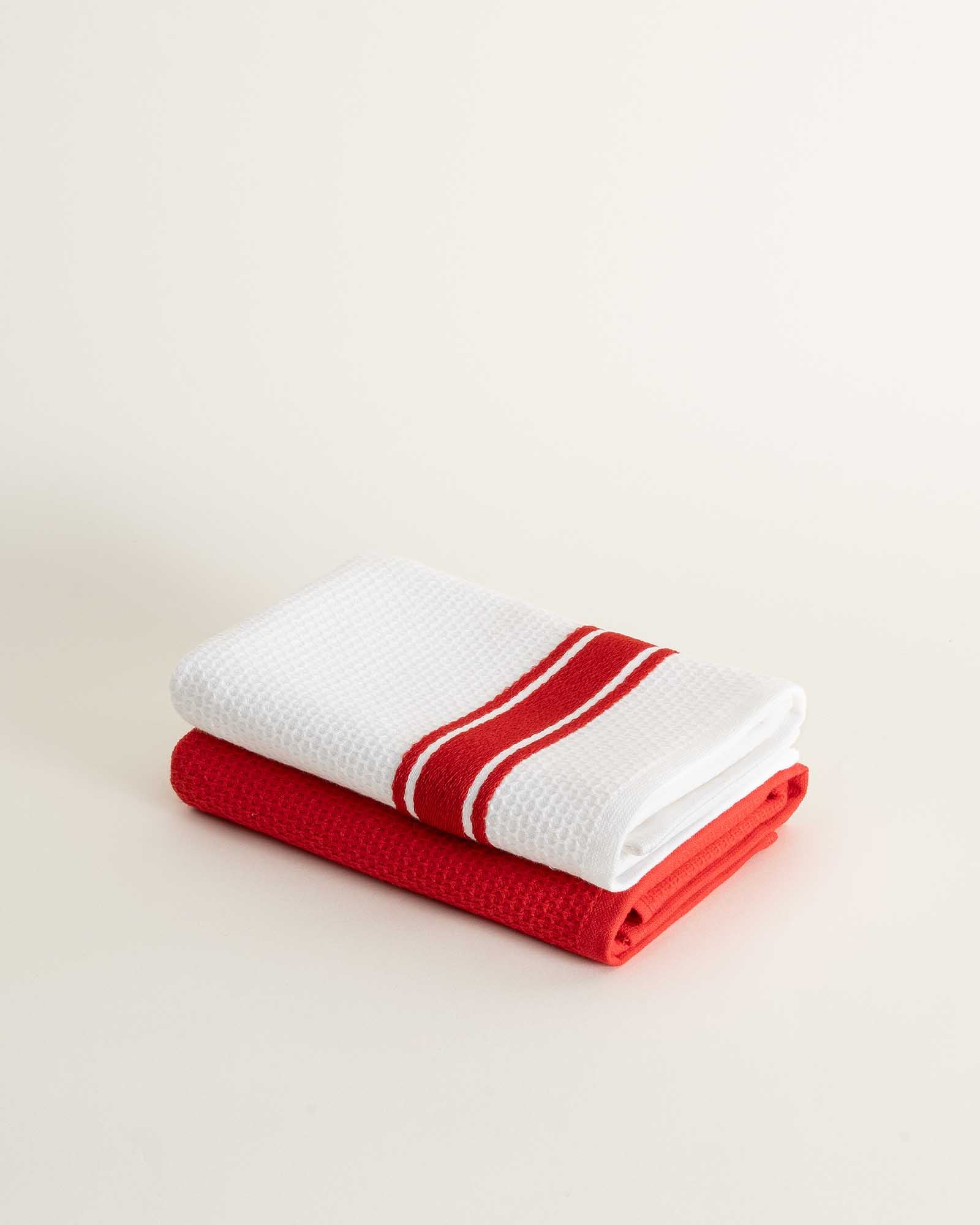 Elvin Organic Aegean Cotton Kitchen Towel set of 2 in Ruby Romance, neatly folded, highlighting its rich, vibrant colour and soft texture