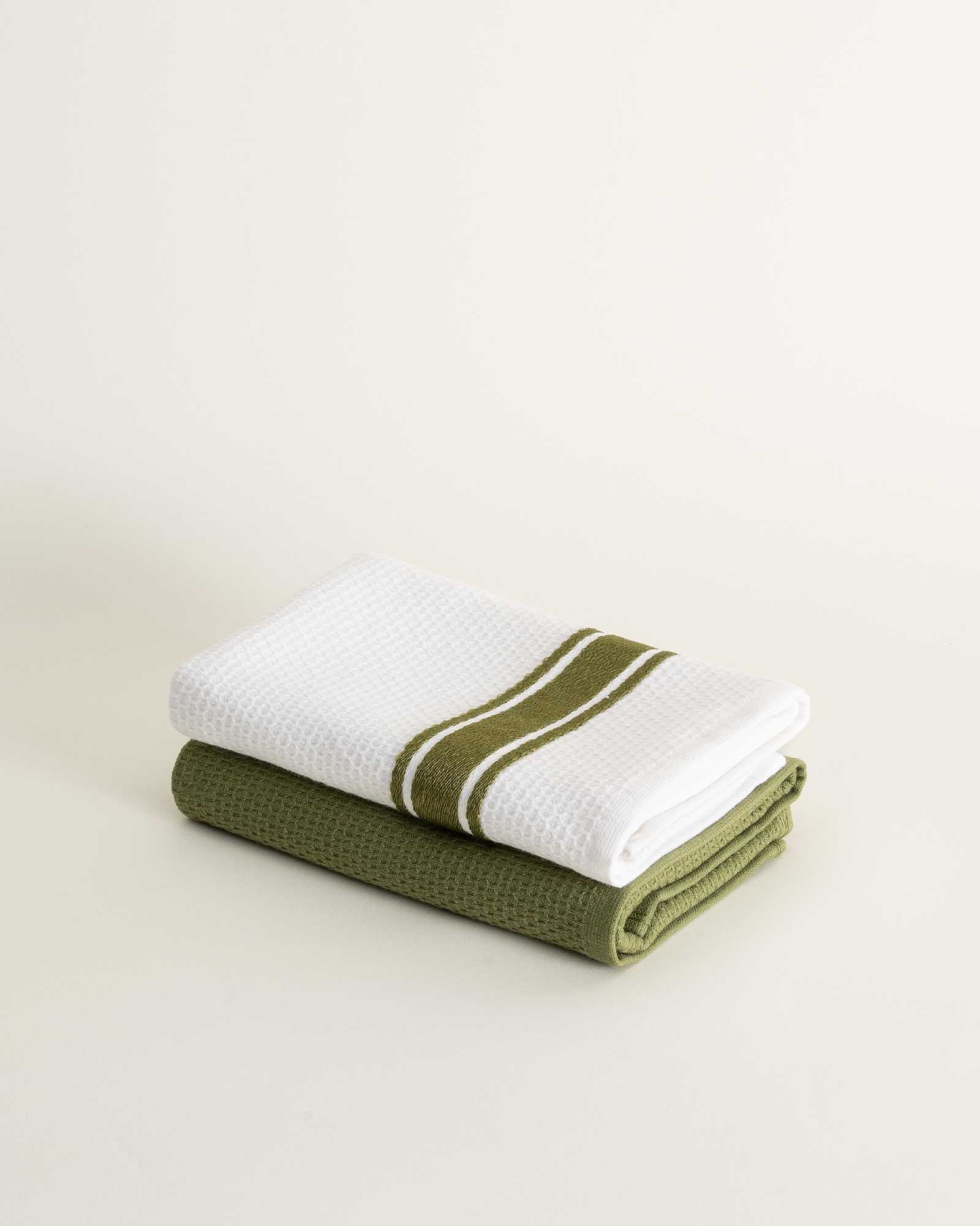 Elvin Organic Aegean Cotton Kitchen Towel set of 2 in Olive Oasis, neatly folded, showcasing its earthy colour and soft, luxurious texture