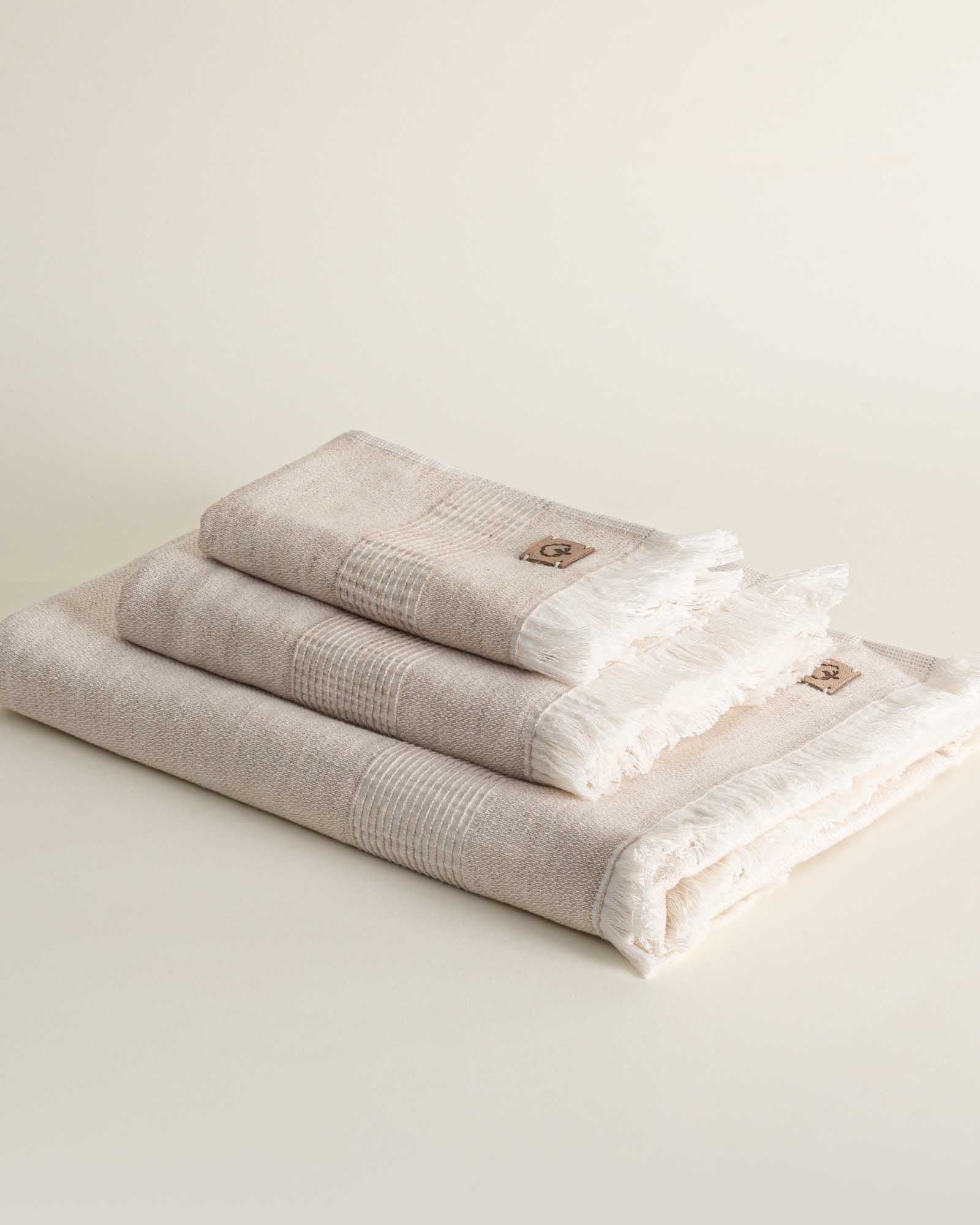 Minoa Hasna Organic Aegean Cotton and Linen Bath Set in Sandy Whisper colour, highlighting its luxurious blend of organic cotton and linen, designed for sustainable luxury