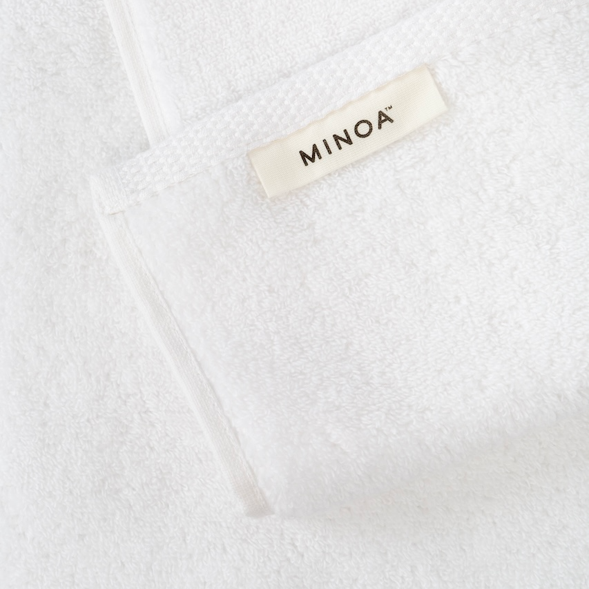 Close-up of Moonlight Pearl Plush Lite Aegean Cotton towel by Minoa USA Canada, highlighting soft, plush texture and luxurious feel of premium organic bath towels