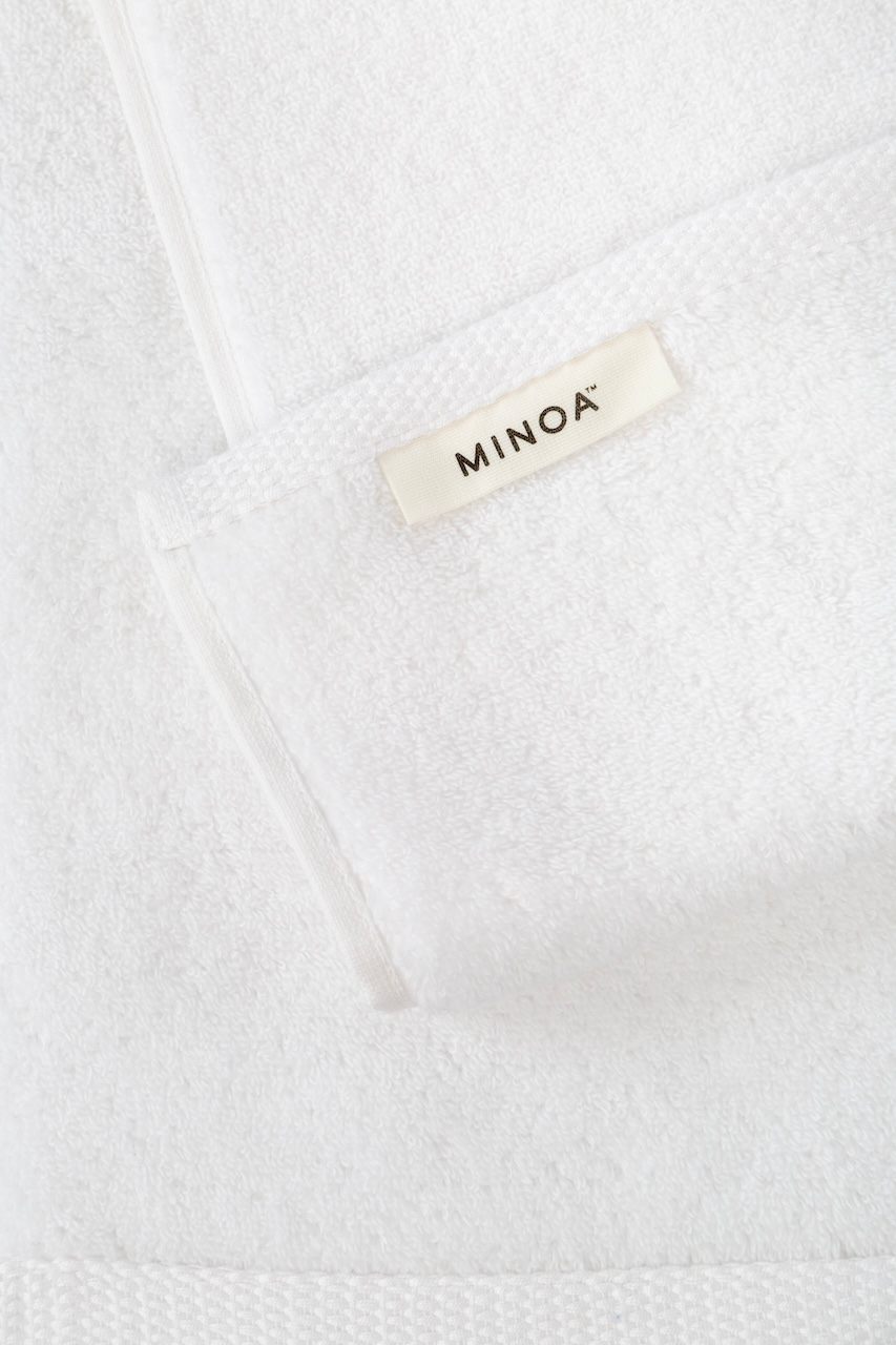 Close-up of Moonlight Pearl Plush Lite Aegean Cotton towel by Minoa USA Canada, highlighting soft, plush texture and luxurious feel of premium organic bath towels