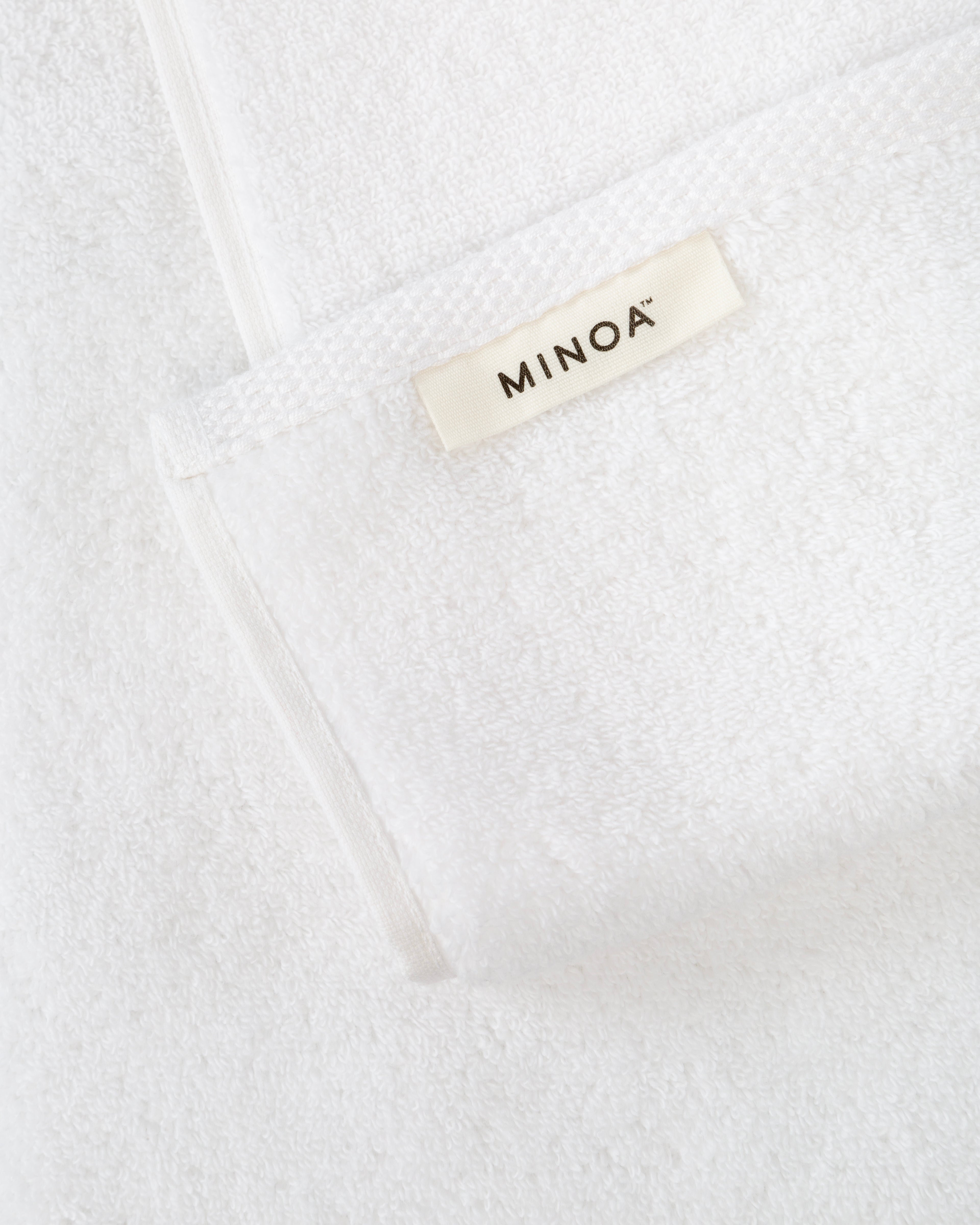 Close up shot of large size Moonlight Pearl Plush Lite 500-Gram Turkish Aegean Cotton luxury bath towel, showing its soft texture