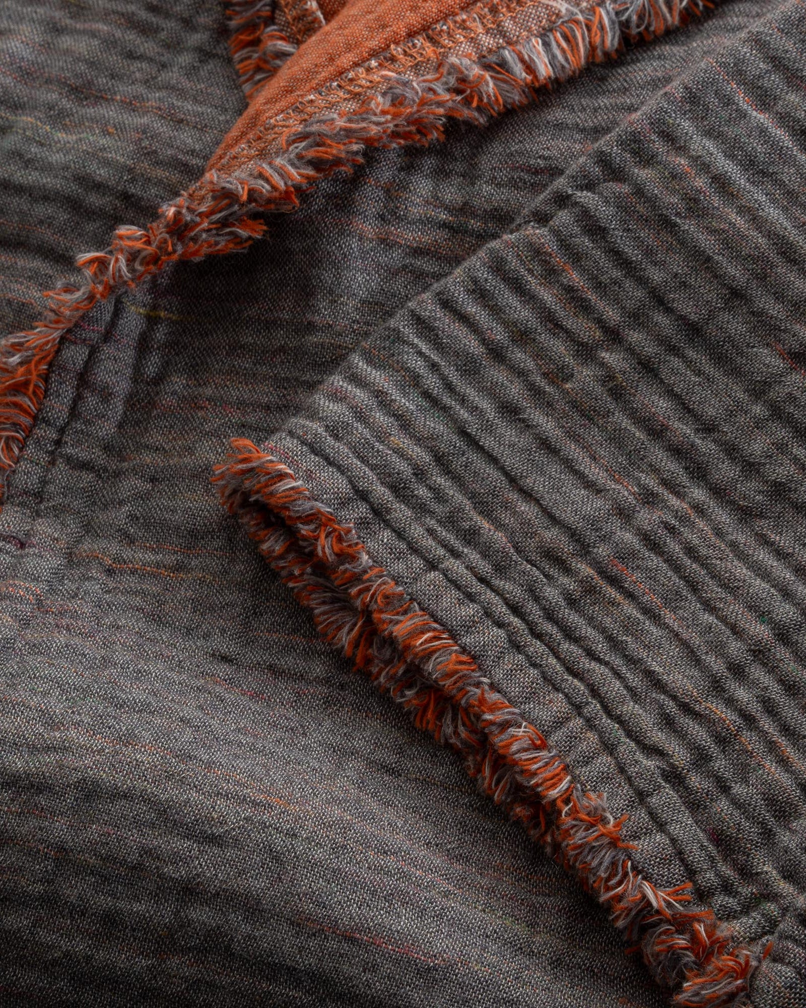 Close-up of the sleeve of the Women's Muna Organic Aegean Cotton Gauze Two-Sided Robe, highlighting its soft texture, luxurious fabric, and clean, refined stitching