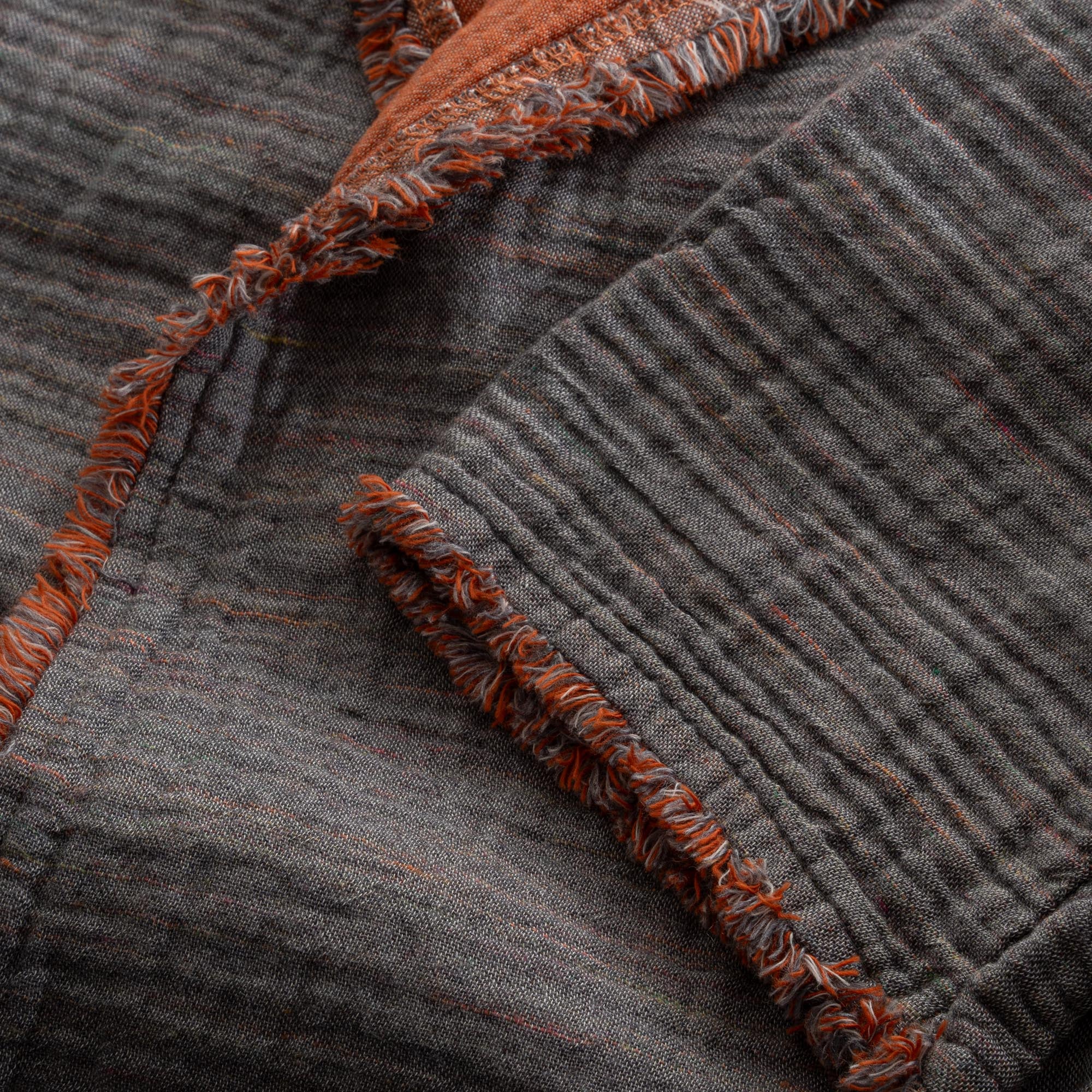Close-up of the sleeve of the Women's Muna Organic Aegean Cotton Gauze Two-Sided Robe, highlighting its soft texture, luxurious fabric, and clean, refined stitching