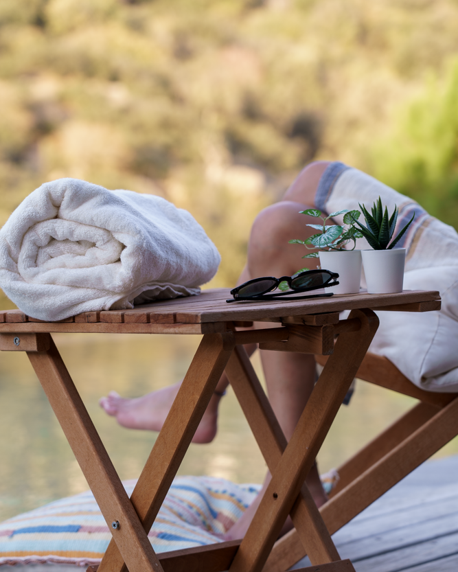 Plush Lite 500-gram Aegean Cotton large bath towel pack of four in Moonlight Pearl by Minoa USA Canada, rolled up to showcase luxurious softness, elegant color, and premium organic bath towels quality