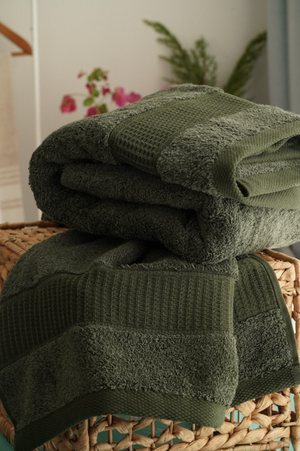 Folded Minoa USA Canada sustainable luxury hand towel from the Naia and cotton collection, showcasing soft texture, premium quality, and eco-friendly fabric