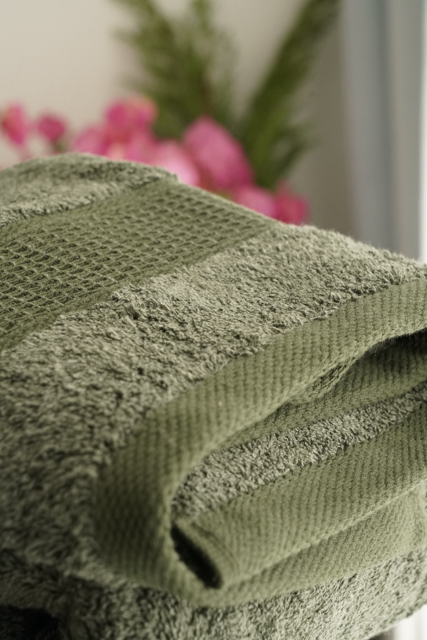 Top-view close-up of Minoa USA Canada sustainable luxury hand towel from the Naia and cotton collection, showcasing soft texture, plush fabric, and premium quality