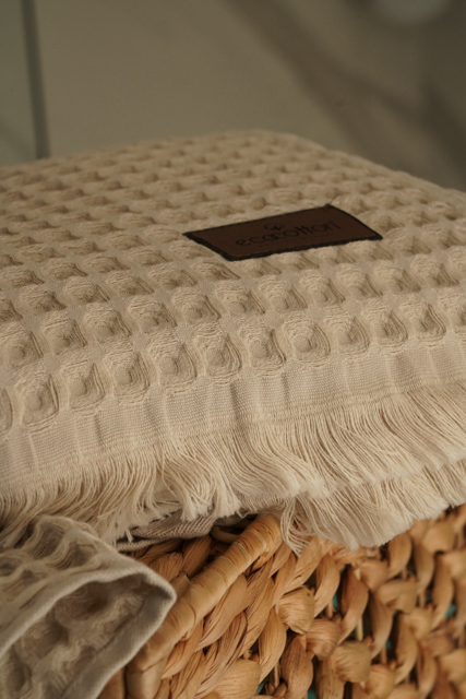 Close-up of Minoa USA Canada Seren organic cotton waffle luxury bath towels showing their plush texture, elegance, and sustainable luxury