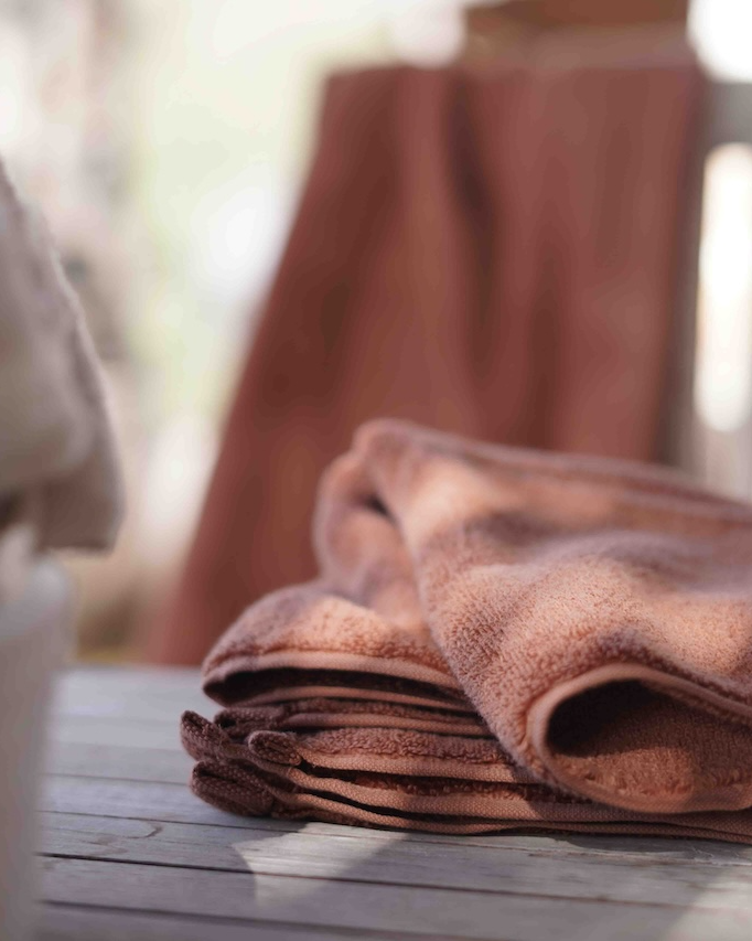 Brown towel on a table with a blurred background