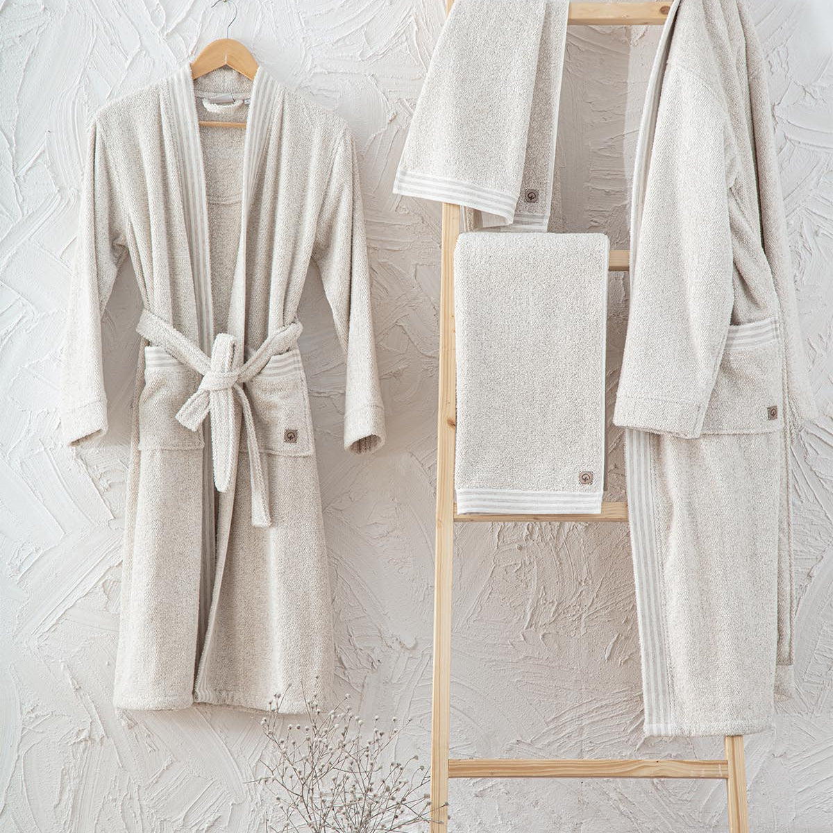 Minoa's organic, luxury bath robe -Raisa Hemp & Organic Cotton Mens Robe hanging on the wall