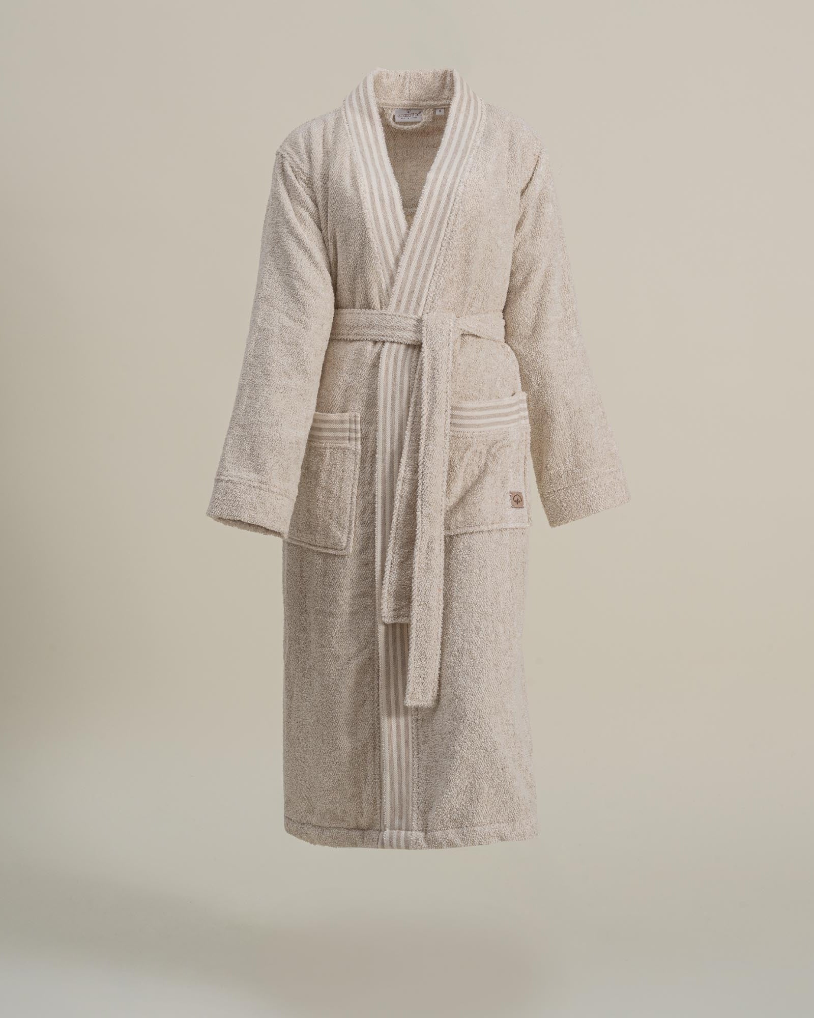 Front view of Minoa's Raisa Hemp & Organic Cotton Women’s Robe, a sustainable luxury bath robe featuring a relaxed fit and natural texture for everyday comfort and elegance.