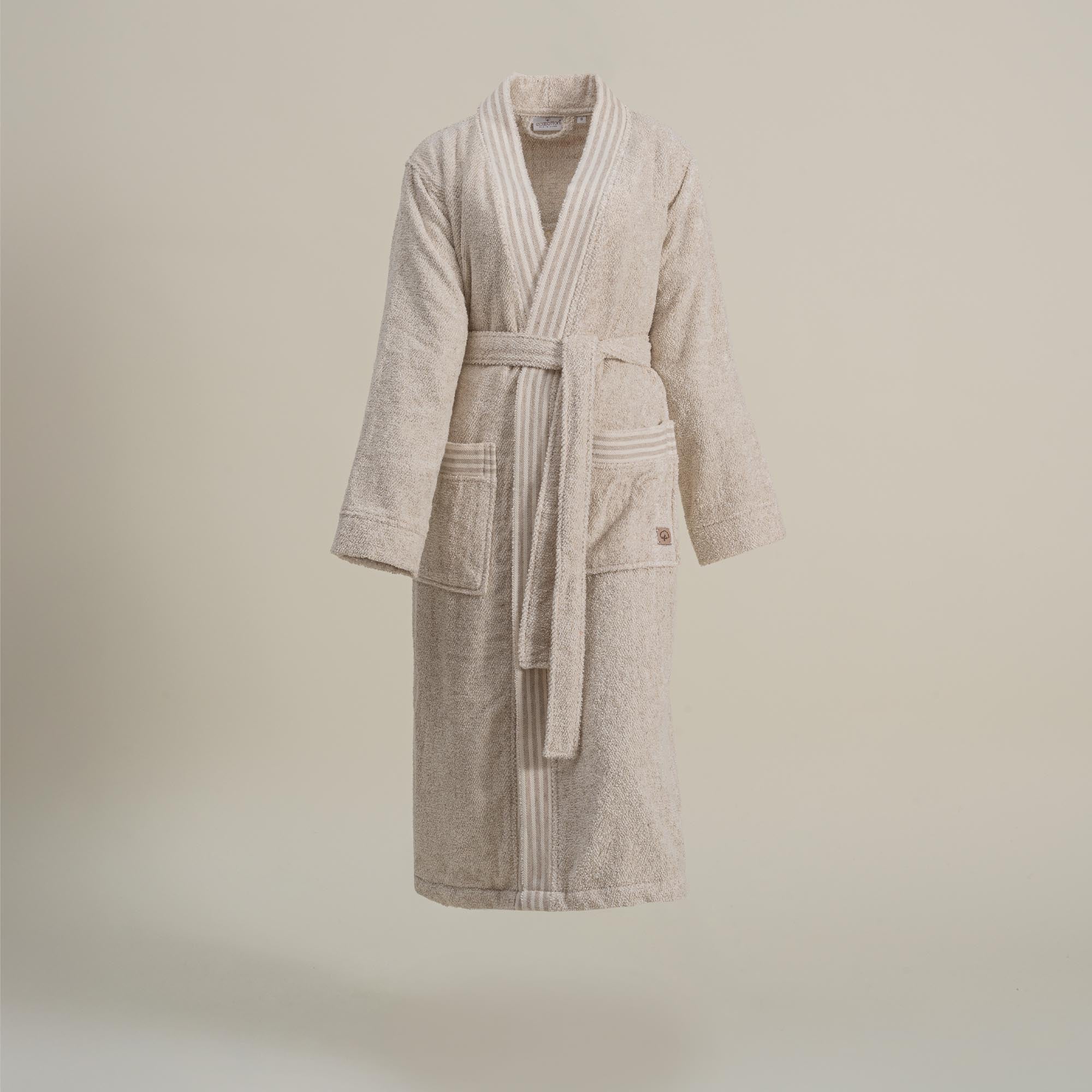 Front view of Minoa's Raisa Hemp & Organic Cotton Women’s Robe, a sustainable luxury bath robe featuring a relaxed fit and natural texture for everyday comfort and elegance.