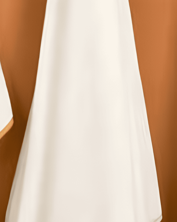 White towel with crow characters hanging on a wooden hook against a brown background