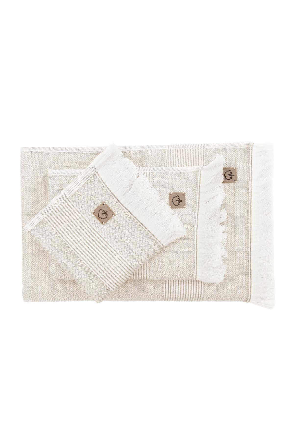 Top view of Minoa Hasna Organic Aegean Cotton and Linen Bath Set in Sandy Whisper, highlighting the luxurious texture and eco-friendly design of the organic cotton and linen blend