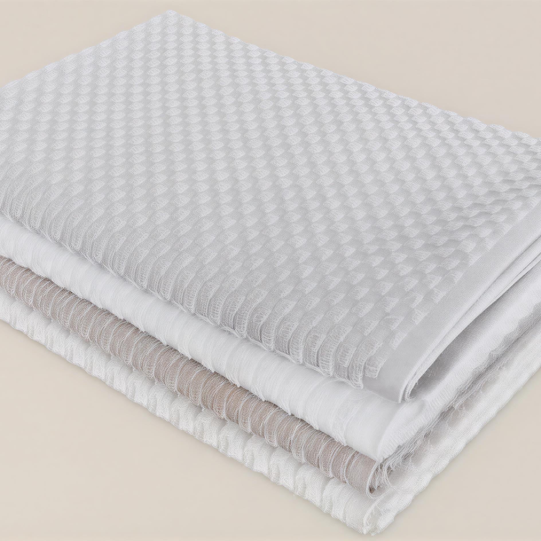 Re&Up 250-GSM Cotton Towel with a checker pattern, an organic cotton towel made from 75% pure cotton and 25% recycled cotton fibres, offering a quick-dry, sustainable option for your bathroom