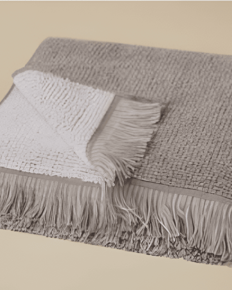 Plush 650-GSM Cotton Terry Towel in grey, an organic cotton towel with eyelash fringe, offering a soft, absorbent feel and stylish look.