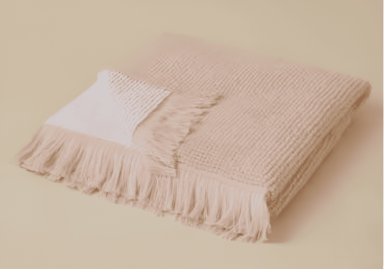 Plush 650-GSM Cotton Terry Towel in pink, an organic cotton towel featuring eyelash fringe, showcasing its soft texture and luxurious design.
