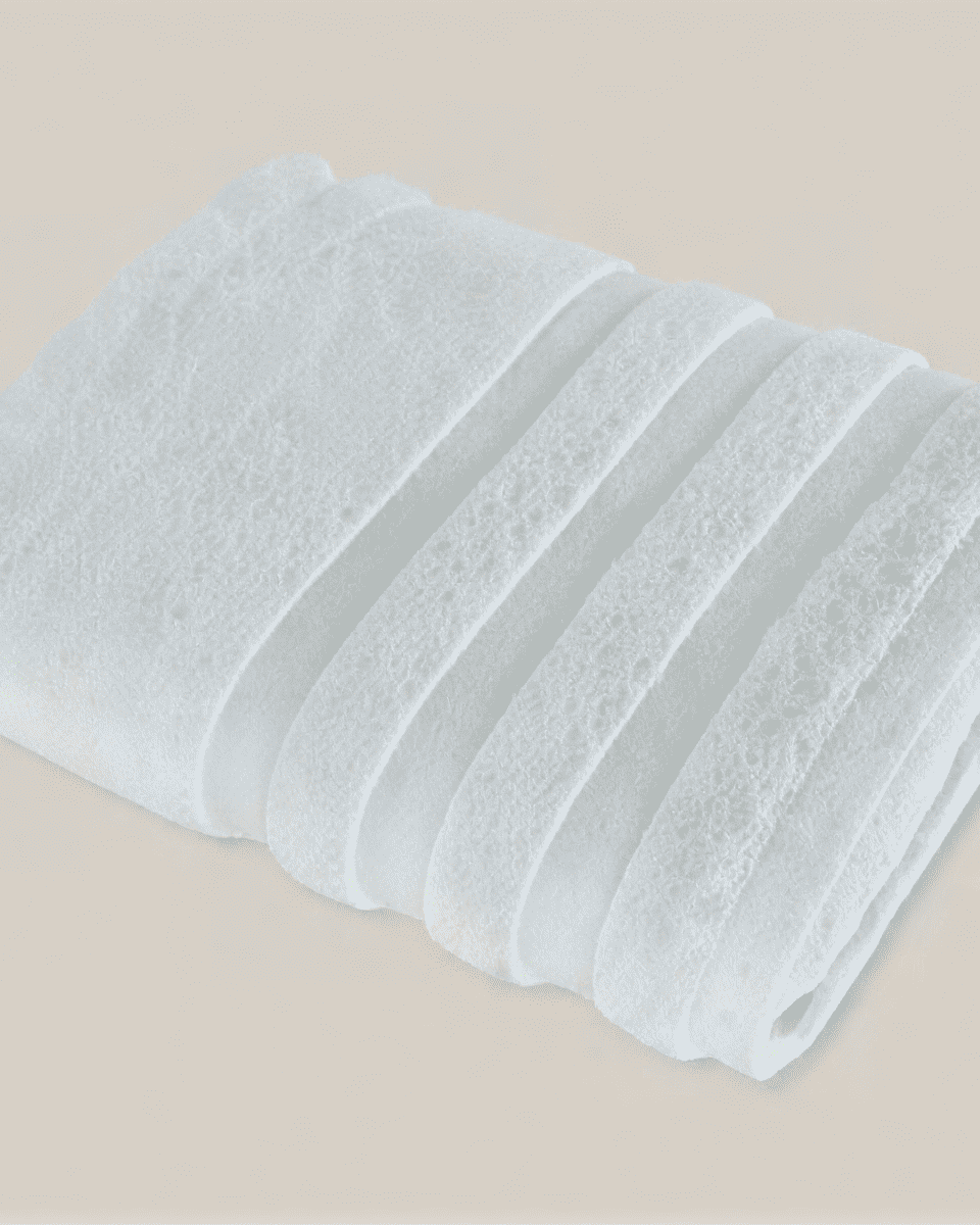 Velora 550-GSM Cotton Towel in mint, an organic cotton towel designed with soft cotton for a fresh, cozy experience after every bath or shower.