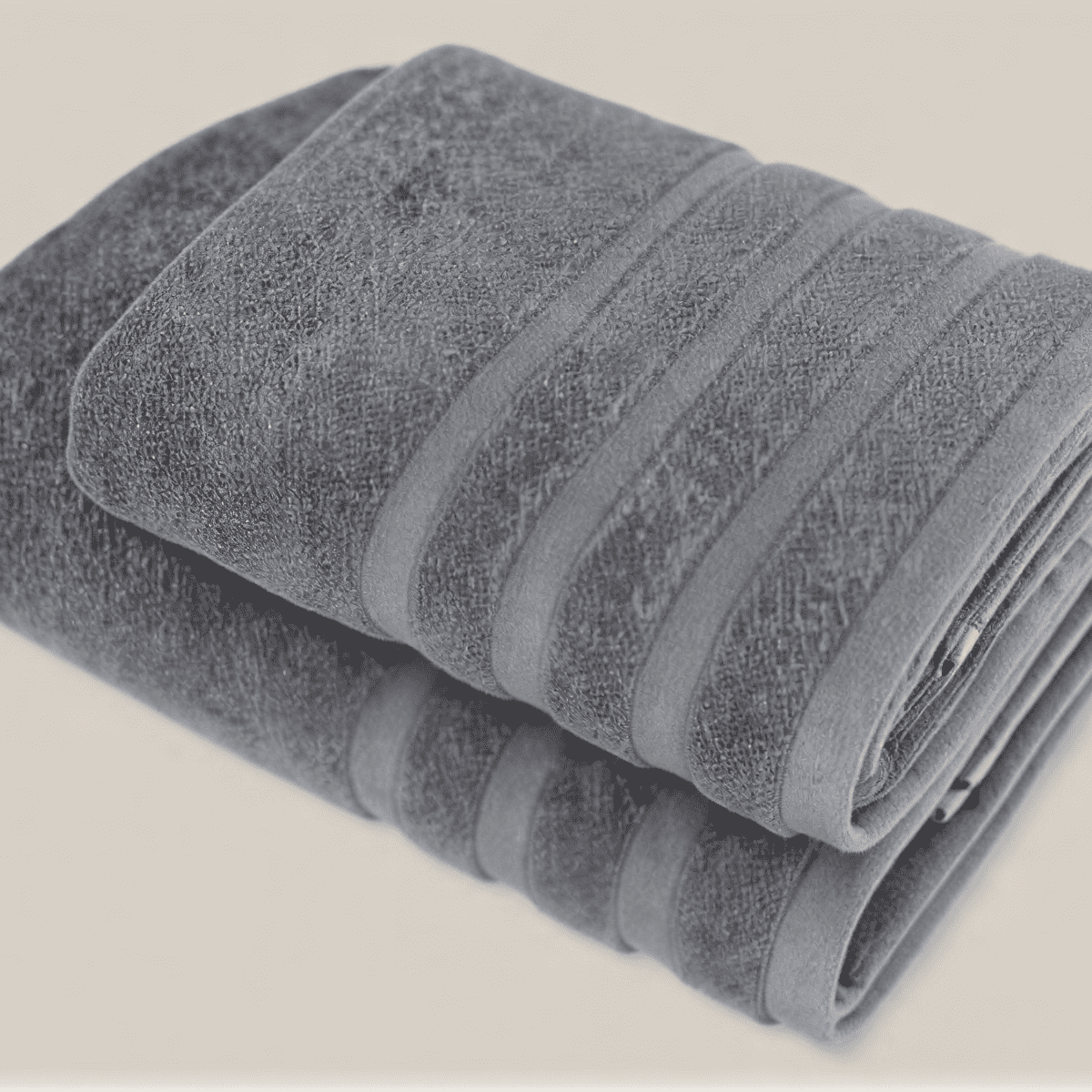 Velora 550-GSM Cotton Towel in anthracite, an organic cotton towel combining a deep grey tone with a soft, absorbent cotton texture.