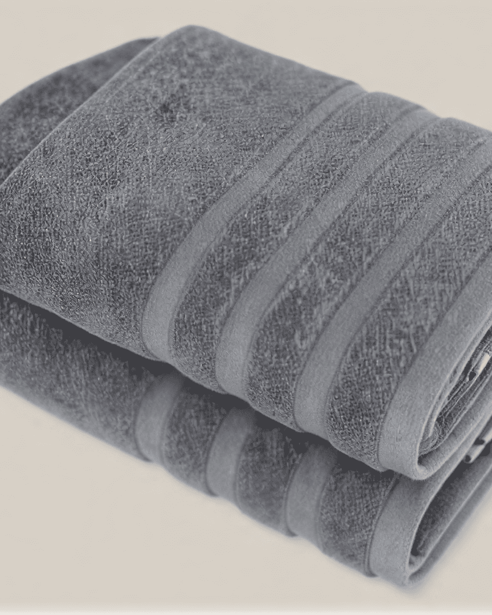 Velora 550-GSM Cotton Towel in anthracite, an organic cotton towel combining a deep grey tone with a soft, absorbent cotton texture.